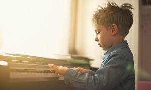 small child playing the piano
